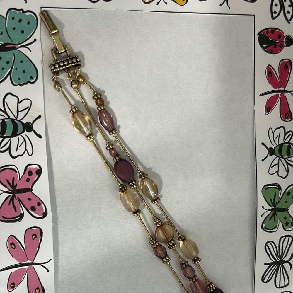 Elegant Gold and Purple Beaded bracelet